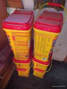lot 795 image: Four Buckets of Weed Preventer