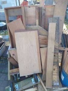 lot 871 image: HUGE Pile of Wood, Casters, Umbrella, Window, Etc