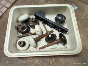 lot 936 image: Small Bin With Several Antique Door Handles