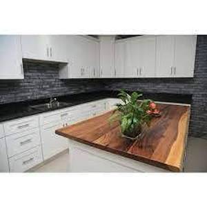 lot 57 image: Hampton Bay 8 ft. L x 25 in. D Finished Saman Solid Wood Butcher Block Countertop With Live Edge