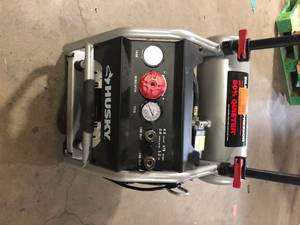 Husky 4.5 Gal. Portable Electric-Powered Silent Air Compressor  Customer Returns See Pictures
