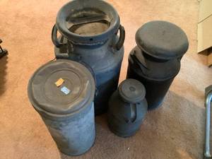 lot 621 image: VintageAntique Metal Milk Jugs