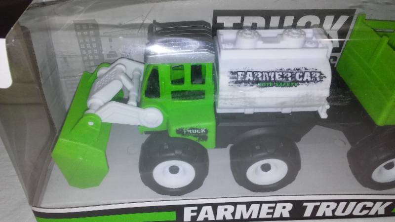 lot 709 image: Friction Farm Tractor Truck & Trailer Set