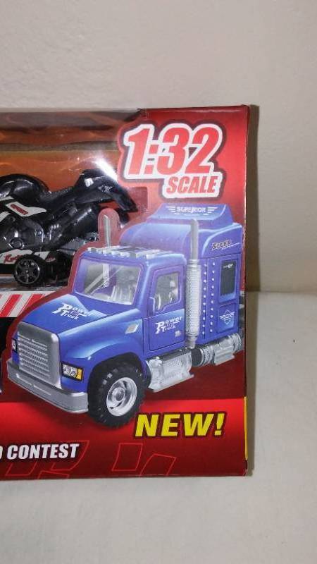 lot 814 image: Friction-Powered Semi-Truck with Motorcycles Set