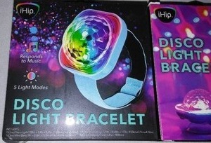 lot 6 image: Rechargeable RGB Disco Light Projector Bracelet (3)