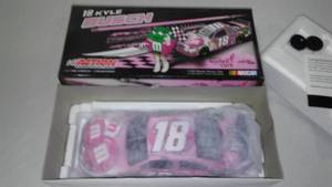 lot 26 image: NASCAR Kyle Busch No.18, MMs, Susan G. Komen