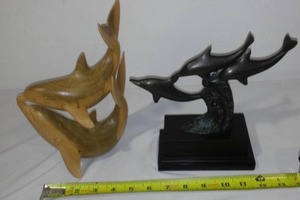 lot 146 image: Dolphins, Metal and Wood.