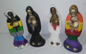 lot 171 image: Ceramic Skeltons (4)