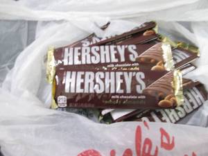 lot 59 image: 12- 1.45 oz Hersheys with Almonds...