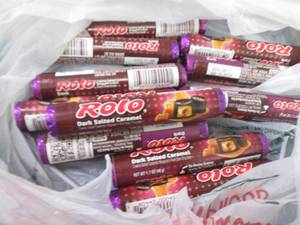 lot 60 image: 12- 1.7 Dark Salted Caramel Rolos...