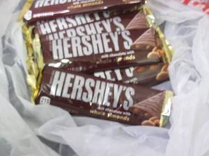 lot 66 image: 12- 1.45 oz Hersheys with Almonds...