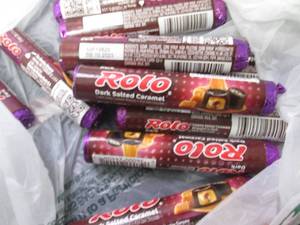 lot 77 image: 12- 1.7 Dark Salted Caramel Rolos...