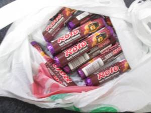 lot 94 image: 12- 1.7 Dark Salted Caramel Rolos...