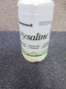 lot 157 image: 8- 32 oz Honeywell Eyewash Saline...