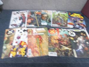 lot 255 image: 10 X-Men Comic Books...