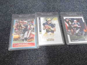 lot 282 image: 3 Tom Brady Cards...