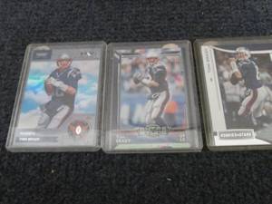 lot 298 image: 3 Tom Brady Cards...