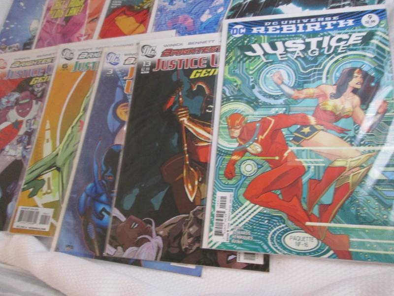 lot 199 image: 15 Justice League Comics...
