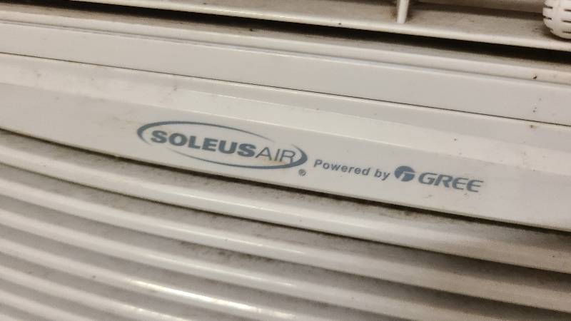 lot 232 image: Used Gree Air Conditioning Window Unit