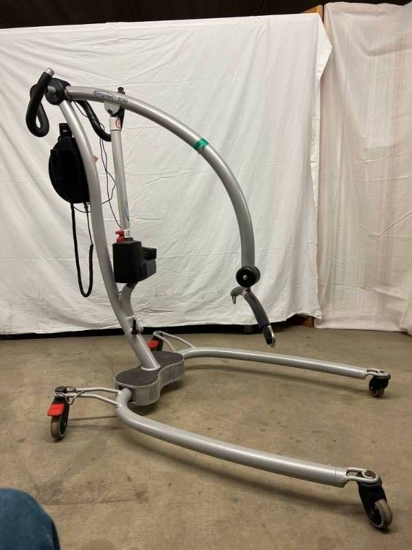 lot 4 image: MSRP $3000 Danish Made Scandinavian Design Ergolet Sole Power Patient Lift 385lb Capacity -Works Great -Plugs Into A Regular Light Socket To Charge&nbspOne of the few power lifts that&nbspcomes apart In two pieces for easy transport With Sling
