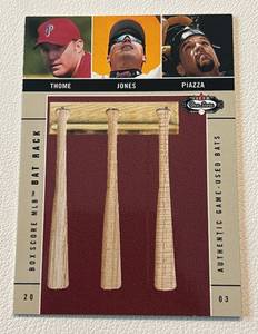 lot 82 image: Triple Bat Reilc 002250 - Jim Thome  Andruw Jones  Mike Piazza - 2003 Fleer Boxscore MLB Bat Rack Rare Game Used Card