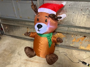 lot 63 image: 3.5 ft Air Blown Inflatable Light Up Baby Reindeer