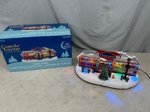 lot 64 image: Carole Towne Tinsel Diner Light Up Musical Decoration