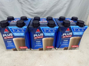 lot 122 image: 12 Atkins Plus Protein Shakes