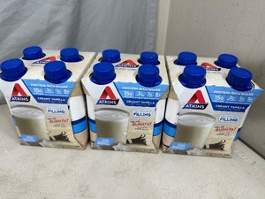 lot 123 image: 12 Atkins Protein Shakes - Vanilla