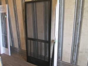 (TRLR) Opened PCA Products Samson Aluminum Screen Door with Frame in Black 36 x 80 - A Little Damage at Bottom Corner
