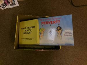 lot 25 image: box of vintage risque swinger adver...