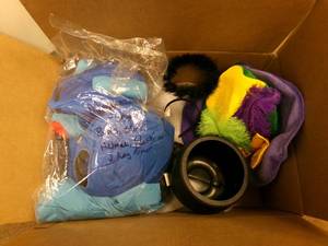 lot 28 image: Halloween costumes and decor...