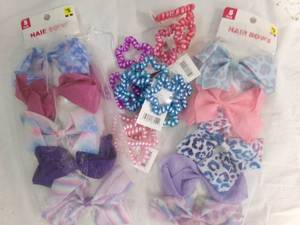 lot 98 image: misc. lot of hair bows and hair tie...
