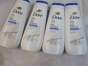 4 Dove Moisturizer 11 oz bottles...