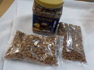Planters Cocoa Almonds and 2 16 oz. Whole Almonds