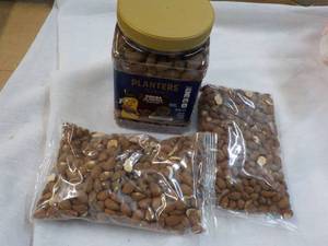 Planters Cocoa Almonds and 2 16 oz. Whole Almonds