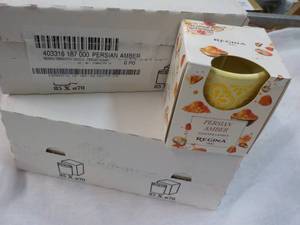 12 Regina Persian Amber Candles...