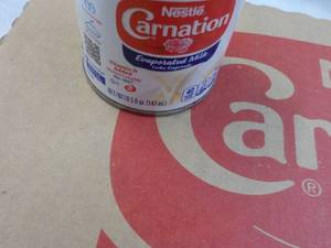 24 ct 5 oz Cans Nestles Carnation Evaporated Milk - best date 08312023