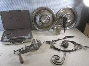 lot 89 image: (F-3) Vintage Jeep Z-Case Portable Stereo, 2 Vintage Pontiac Hubcaps, Vintage Meat Grinder, Paint Gun and Metal Wall Clock