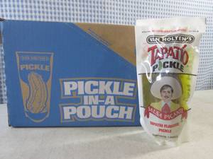 lot 159 image: (C-3) Case of 12 Pickle In A Pouch Jumbo Tapatio Pickles Best by Sept 2024