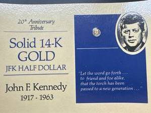 lot 6 image: Solid 14kt Gold JFK Coin