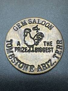 lot 39 image: Gem Saloon Brass Brothel Token