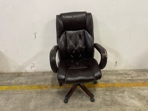 lot 27 image: Leather Chair on wheels