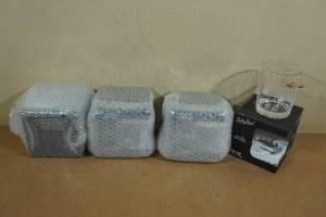 lot 151 image: 4 Lucky Shot Rocks Glasses with Embedded Bullets