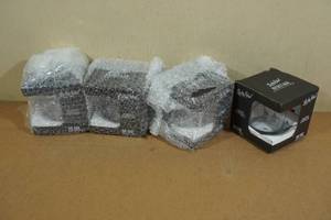 lot 154 image: 4 Lucky Shot Rocks Glasses with Embedded Bullets