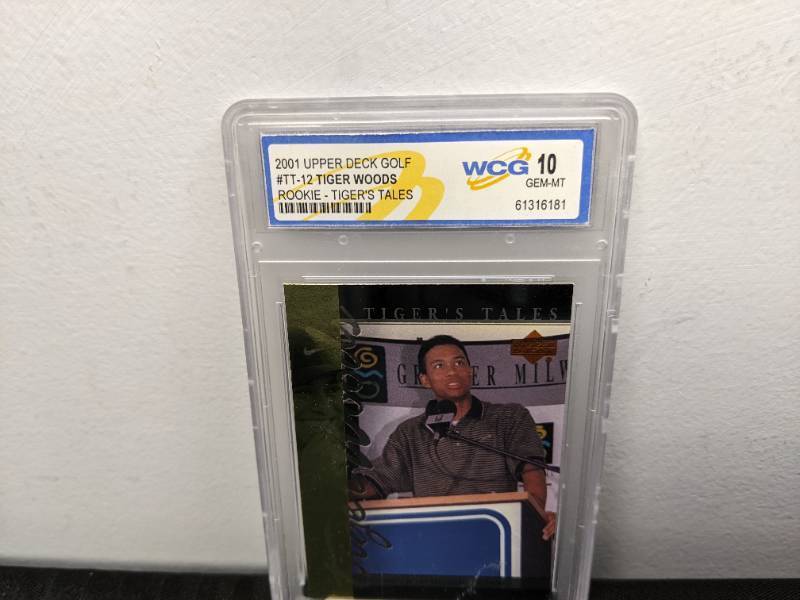 lot 46B image: WCG Graded 10 Tiger Woods 2001 Upper Deck Golf Rookie Tigers Tales Card #TT12 V