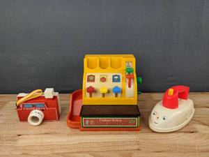 lot 67 image: Vintage Fisher Price Picture Story Camera, Music Box Iron and Cash Register with Coins  M