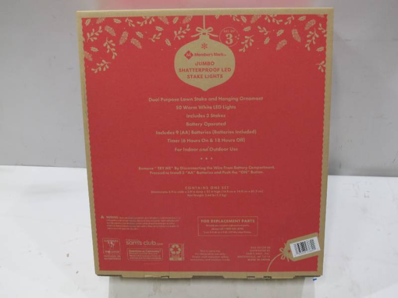 lot 219 image: Members Mark Set of 3 Jumbo OrnamentsLawn Stakes - Red, Green, Blue