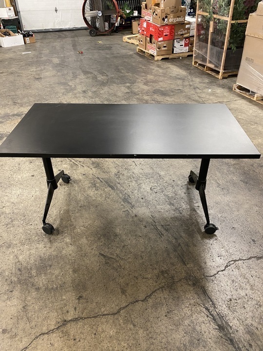 lot 78 image: Black Office Table on Roller Wheels