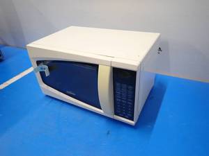 Used Microwave removed from working environment  fully functional, needs to be cleaned out